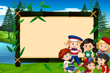 Wall Mural - Banner template design with kids in the park