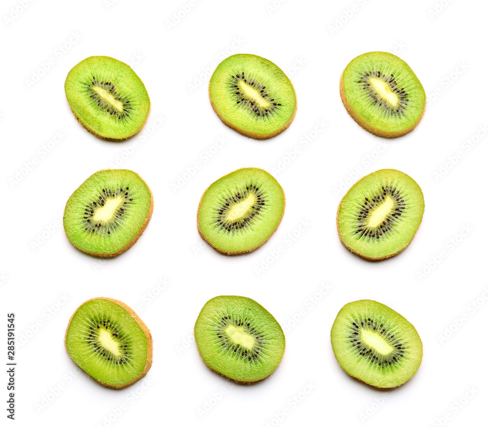 Slices of ripe kiwi on white background