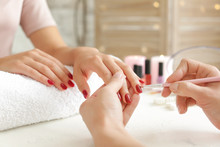 Woman Getting Professional Manicure In Beauty Salon, Closeup