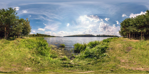 Wall Mural - seamless spherical hdri panorama 360 degrees angle view on grass coast of huge lake or river in sunny summer day and windy weather in equirectangular projection with zenith and nadir, VR content