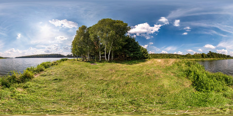 Wall Mural - seamless spherical hdri panorama 360 degrees angle view on grass coast of huge lake or river in sunny summer day and windy weather in equirectangular projection with zenith and nadir, VR content