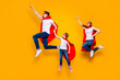 Crazy dad mom and foxy daughter moving up air raise fists wear superhero capes isolated yellow background