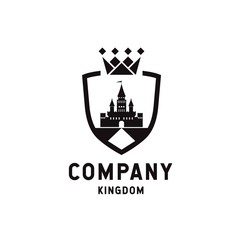 Shield crown logo design with kingdom silhouette inside