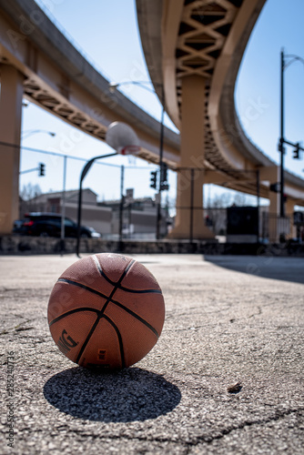 basketball and hoop in city