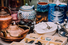 Flea Market. Vintage Stuff. Aesthetics. Fair Of Old Things. Sale Of Unnecessary Things. Garage Sale. Weekend Market. Dishes, Souvenirs, Teapot, Cups, Spoons, Figurines. Antiques. Second Hand