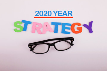 2020 Strategy concept with wooden block