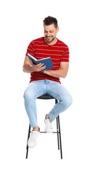 Sticker - Handsome man reading book on white background