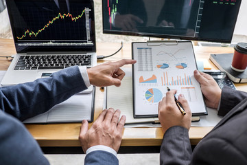 Poster - Business team investment working with computer, planning and analyzing graph stock market trading with stock chart data, business financial investment and technology concept