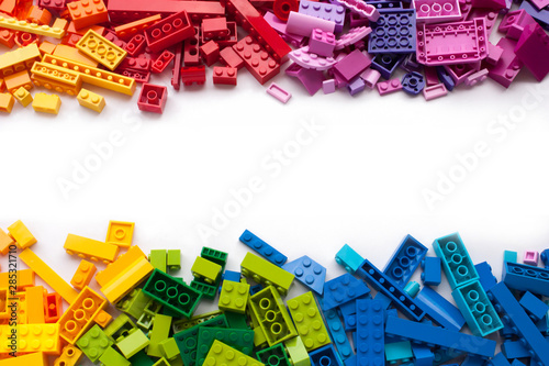 Colorful toy bricks frame with white empty space for your content Poster Mural XXL