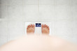© Silk And Salt Images/Stocksy - Measuring BMI on a smart scale