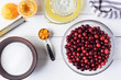 © Julie Rideout/Stocksy - Ingredients for making cranberry sauce