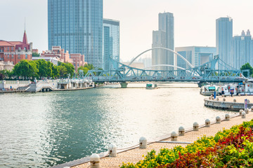 Wall Mural - Cityscape of Tianjin. Haihe river, Jinwan Square, Tianjin Haihe Cultural Square. Located near Tianjin Railway Station, Tianjin, China.