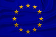 © kittyfly - stylized European Union flag, symbol of united Europe on soft silk with soft folds, close-up