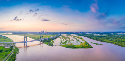 Wall Mural - Harbin skyline. Yangmingtan Bridge and Songhua River. Located in Harbin, Heilongjiang, China.