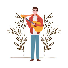 Wall Mural - man with acoustic guitar and branches and leaves in the background