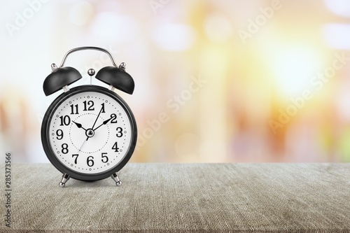 Fotomural Yellow alarm clock on white backgroundYellow alarm clock on white background