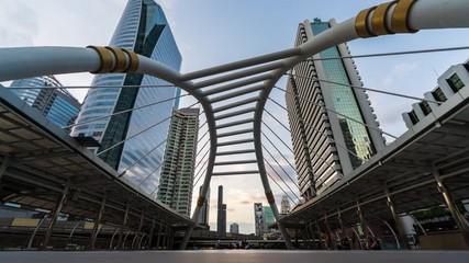 Wall Mural - day to night time lapse of Chong Nonsi skytrain station in Bangkok,  Thailand