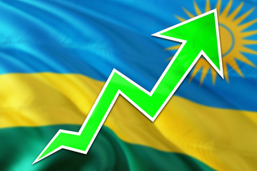 Rwanda economy graph is indicating positive growth, green arrow going up with trend line. Business concept on national background.