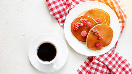 Wall Mural - Healthy summer breakfast,homemade classic american pancakes with fresh berry and honey, morning light white stone background copy space top view