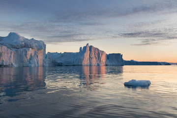 Wall Mural - nature and landscapes of greenland or antarctica. travel on the ship among ices. studying of a pheno