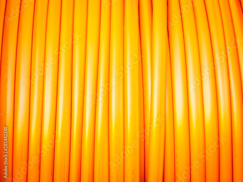 Fotomural communication cable in orange on a roll