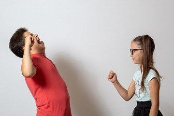 Children play. Rock, paper, scissors