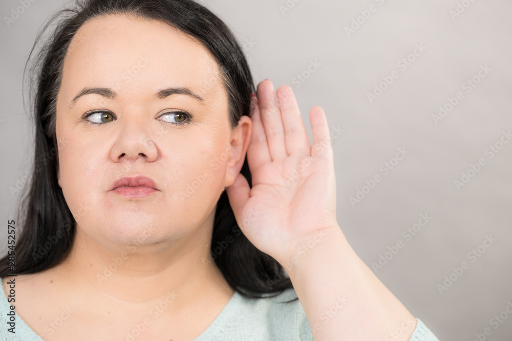 Woman overhearing listening to rumors. - obrazy, fototapety, plakaty 