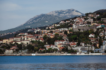 city ​​on the shore of a beautiful blue lake