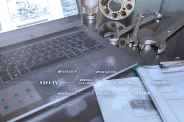 set of tools parts service report sheet and laptop computer on mechanic engineer table, process of m