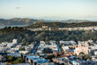 Low aerial view of Inner Sunset and Richmond districts of San Francisco with Golden Gate Bridge in Background