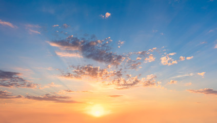 Wall Mural - gentle sky at sunset sunrise with real sun and clouds