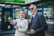 © romul014 - An older man and a young colleague are talking about work