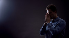 Faithful Male Praying To God, Asking For Blessing And Forgiveness, Belief