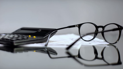 Glasses better vision lying on business person table, poor eyesight, exhaustion