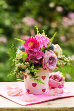 Colorful Flower Bouquet In A Coffee Cup