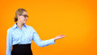 Attractive lady eyeglasses presenting template orange background, announcement