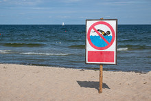 No Swimming Warning Sign On The Beach