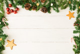 Fototapeta Nowy Jork - Flat lay with Christmas garland frame