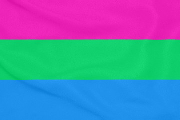 Wall Mural - Polysexual community flag on a textured fabric. Pride symbol