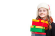 © danmorgan12 - Positive Caucasian Girl With Heap of Gift Boxes Posing in Winter Outfit Against Pure White in Studio.