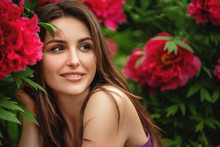 Outdoor Fashion Photo Of Beautiful Young Woman Surrounded By Flowers. Spring Blossom