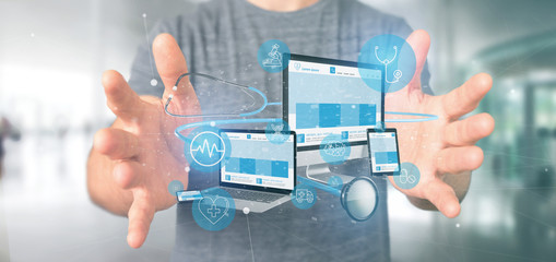 Poster - Businessman holding Devices with medical icon and stethoscope 3d rendering