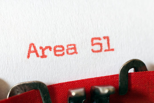 Area 51 typed on typewriter on red