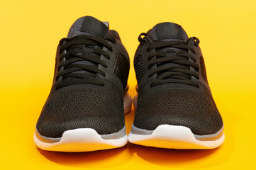 Canvas Print - Front view of black sport shoes