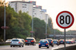 © Marko Rupena - 80km/h Speed limit sign a highway full of cars