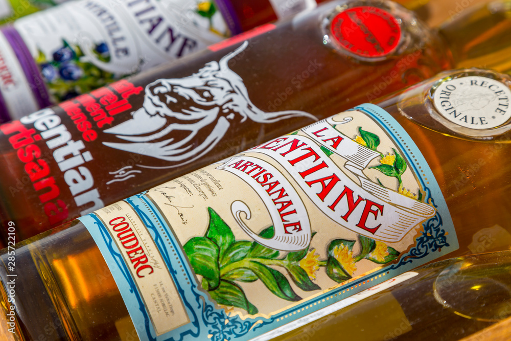 Puy Mary, France - November 2, 2014: Close-up image of few bottles of traditional French Gentian Liquor, specific for Auvergne region located in central France.