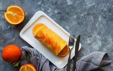 orange rolled cake portuguese. Brazo de naranja, Tarta portuguesa, flan, egg sweet cake, copy space