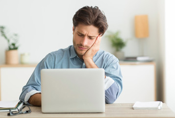 Tired Guy Sleeping Sitting At Computer Laptop In Office