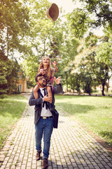 Wall Mural - father with their daughter after school have fun.