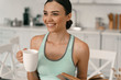 © Yakobchuk Olena - Merry girl drinking coffee and reading stock photo